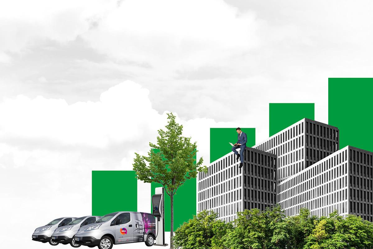 An illustration of a man in a suit sitting on top of a grey and glass office building, while working on a laptop. Green treetops are nearby, and three Mitie-branded vans are electrically charging on the right-hand side. A green bar graph descends in the background